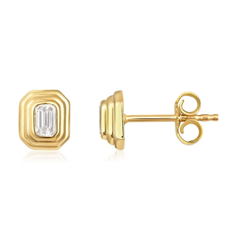 The Karat Concierge Gatsby Stud emerald cut diamond earrings in 14K yellow gold with a faceted bezel setting.