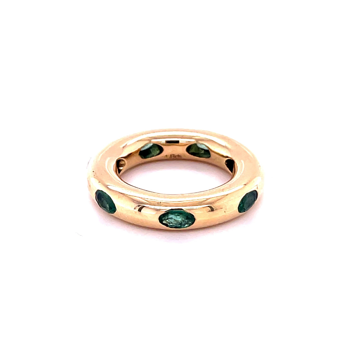 The Karat Concierge 14KT yellow gold donut ring featuring oval cut emeralds in a sleek, whimsical stackable design.