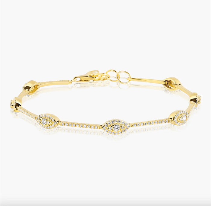The Karat Concierge Georgia bracelet in 14K yellow gold featuring marquise-shaped evil eye motifs with .7 CTW diamonds.