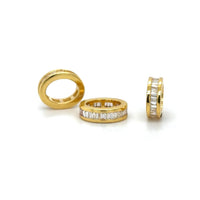 The Karat Concierge 14K yellow gold oval bangle rondelles with channel set baguette diamonds on a white background