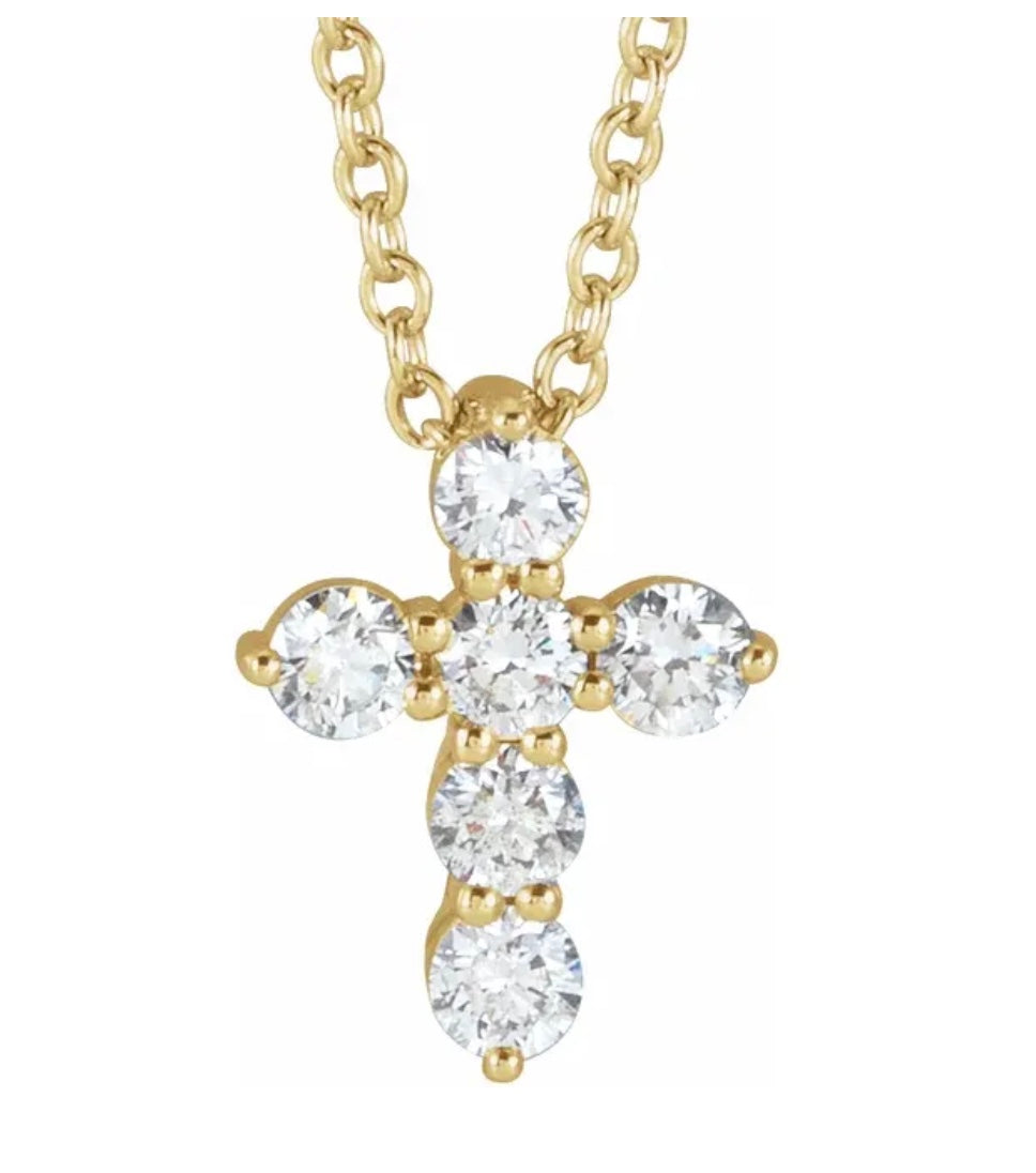 The Karat Concierge diamond cross pendant necklace featuring five brilliant-cut diamonds set in yellow gold.