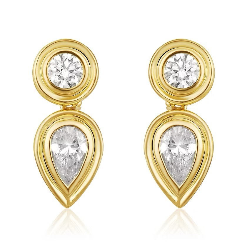 The Karat Concierge Gatsby drop earrings in 14K gold featuring bezel-set round and pear-shaped natural diamonds.
