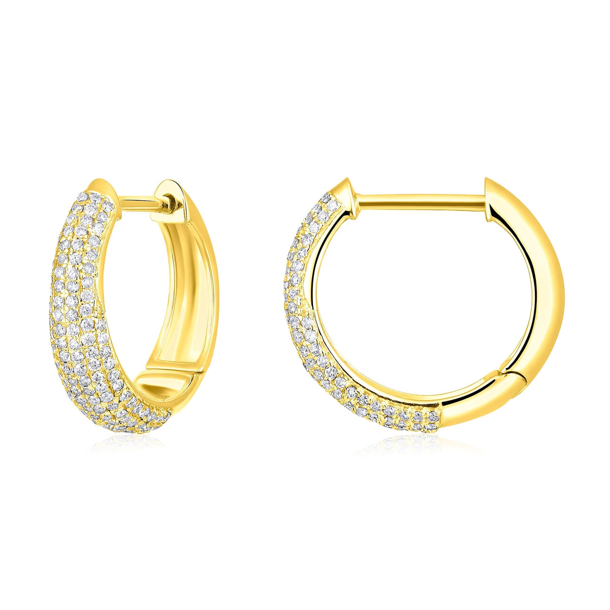 The Karat Concierge Myra huggie earrings in 14K gold featuring rows of sparkling natural pave diamonds.
