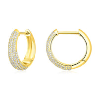 The Karat Concierge Myra huggie earrings in 14K gold featuring rows of sparkling natural pave diamonds.
