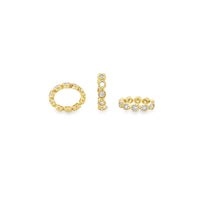 The Karat Concierge 14K yellow gold oval rondelle bangle charms featuring sparkling diamond settings.