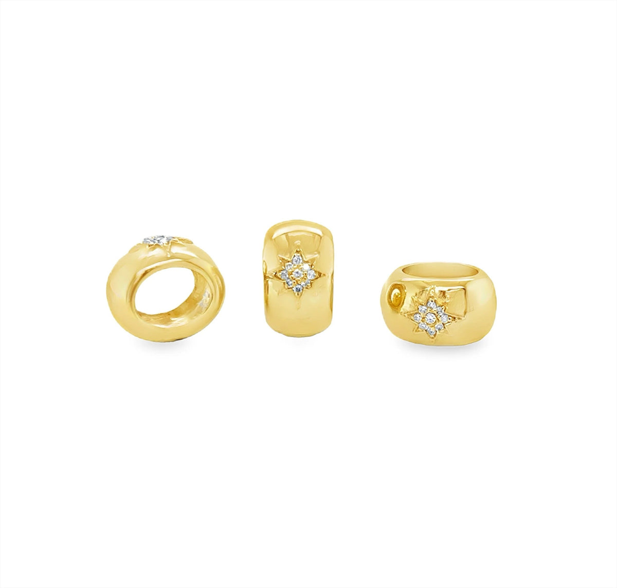 The Karat Concierge 14K yellow gold oval rondelle charms with star-shaped diamond settings for bangle bracelets