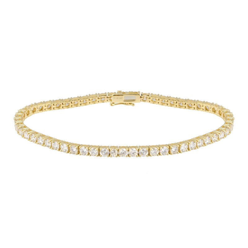 The Karat Concierge 14K yellow gold tennis bracelet featuring a 4 prong diamond setting and a double safety latch.