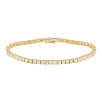 The Karat Concierge 14K yellow gold tennis bracelet featuring a 4 prong diamond setting and a double safety latch.