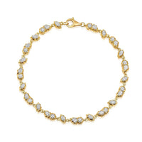 The Karat Concierge Regalia tennis bracelet in 14K yellow gold with alternating diamond shapes and a lobster clasp.