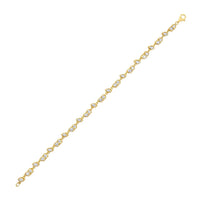 The Karat Concierge tennis bracelet in 14K yellow gold with alternating diamond shapes and a secure lobster clasp.