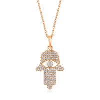 The Karat Concierge 14K gold Hamsa pendant necklace encrusted with 109 sparkling natural diamonds.