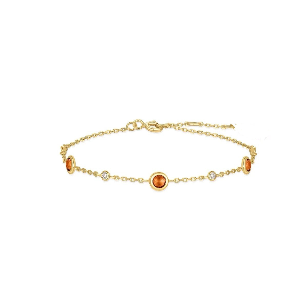 The Karat Concierge burnt orange bezel set bracelet in 14K gold plating with cubic zirconia and nano gems.