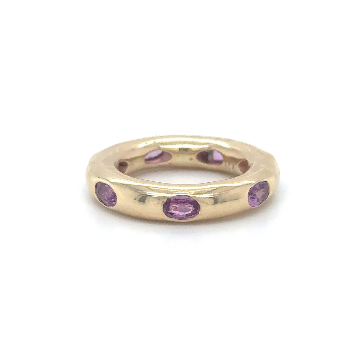 The Karat Concierge 14KT yellow gold donut ring featuring oval-cut pink sapphires in a sleek, whimsical setting.