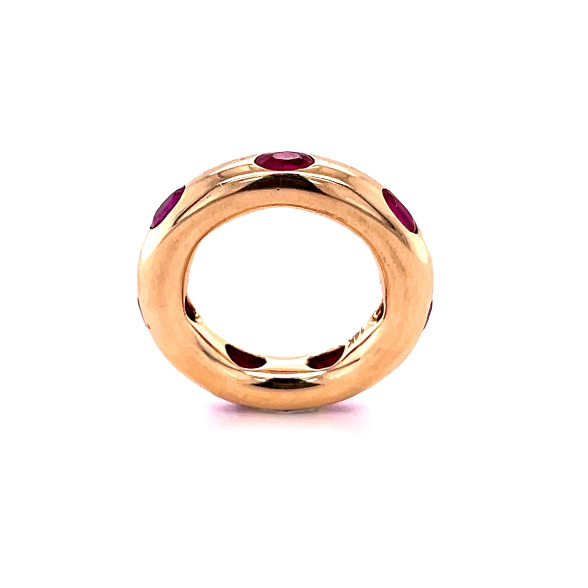 The Karat Concierge 14KT yellow gold donut ring featuring vibrant oval rubies in a sleek, whimsical stackable design.