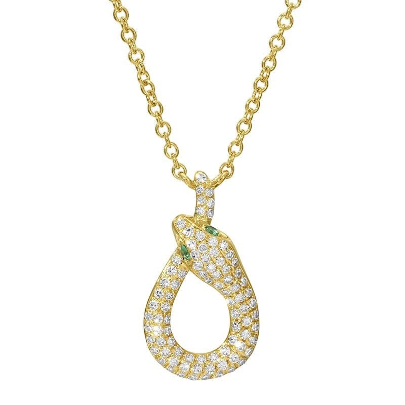The Karat Concierge 14K yellow gold snake necklace with pavé diamonds and green tsavorite eyes on an 18-inch chain.