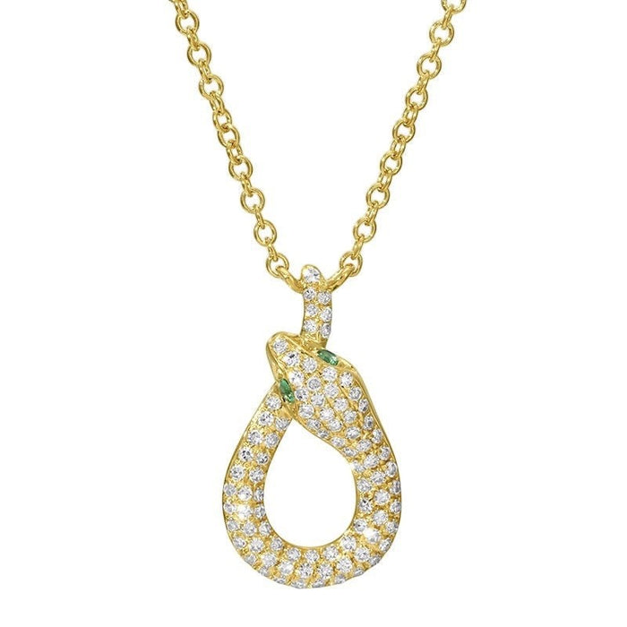 The Karat Concierge 14K yellow gold snake necklace with pavé diamonds and green tsavorite eyes on an 18-inch chain.