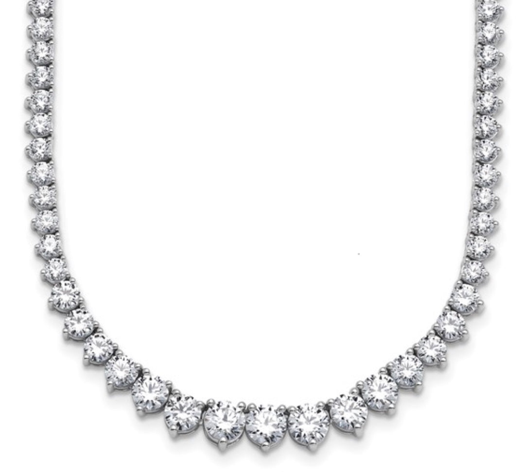 The Karat Concierge graduated tennis necklace in 14K white gold with sparkling stones in a classic 3-prong setting.