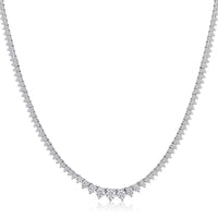 The Karat Concierge graduated tennis necklace in 14K white gold with a classic 3-prong setting and sparkling stones.