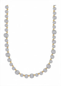 The Karat Concierge 14K yellow gold tennis necklace featuring 29 lab-grown diamonds in a Georgian 8-prong setting.