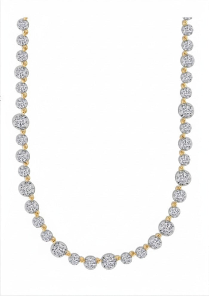 The Karat Concierge 14K yellow gold tennis necklace featuring 29 lab-grown diamonds in a Georgian 8-prong setting.
