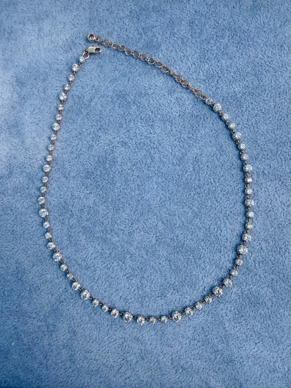 The Karat Concierge 14K yellow gold tennis necklace with 10.25ct lab-grown diamonds in a Georgian 8-prong setting.
