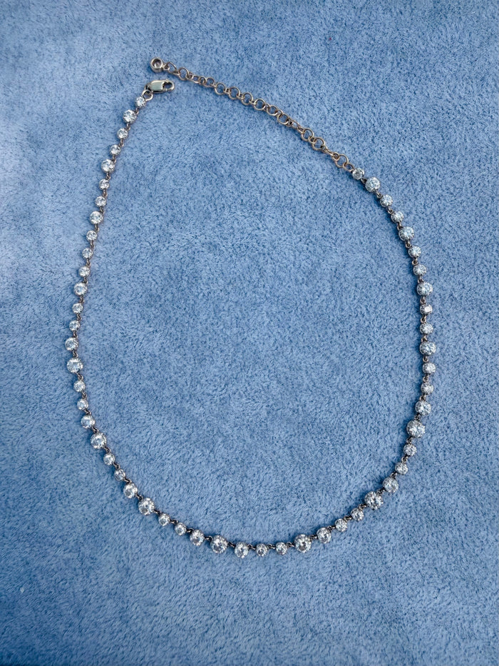 The Karat Concierge 14K yellow gold tennis necklace with 10.25ct lab-grown diamonds in a Georgian 8-prong setting.