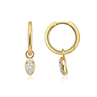 The Karat Concierge 14K yellow gold huggie earrings featuring marquise-cut diamond drops in a refined hinged design.