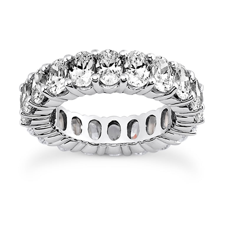 The Karat Concierge oval lab grown diamond eternity band in polished white metal with FG color VS clarity stones.