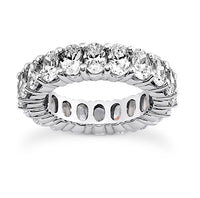 The Karat Concierge oval lab grown diamond eternity band in polished white metal with FG color VS clarity stones.