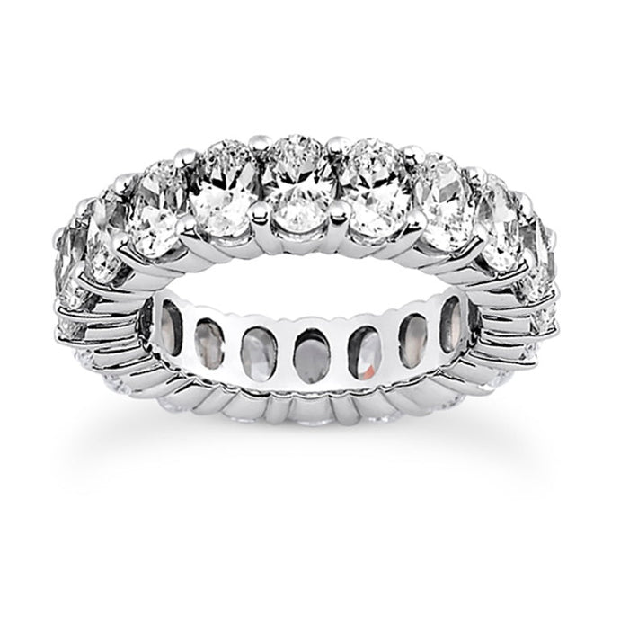 The Karat Concierge oval lab grown diamond eternity band in polished white metal with FG color VS clarity stones.