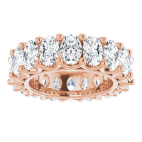The Karat Concierge oval lab grown diamond eternity band set in polished rose gold with FG color VS clarity stones.