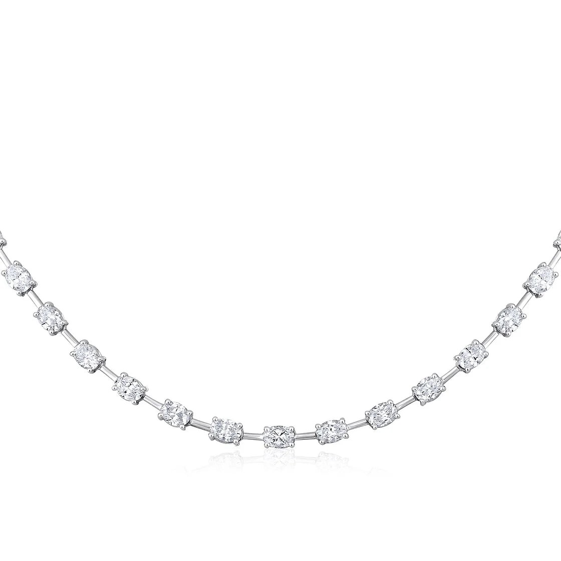 The Karat Concierge Madyson oval tennis necklace in 14K white gold with 3.7 carat oval natural diamonds.