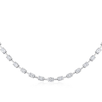 The Karat Concierge Madyson oval tennis necklace in 14K white gold with 3.7 carat oval natural diamonds.
