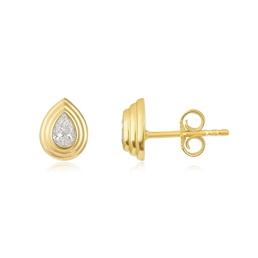 The Karat Concierge Gatsby Stud earrings featuring pear-shaped diamonds in 14K yellow gold faceted bezel settings.