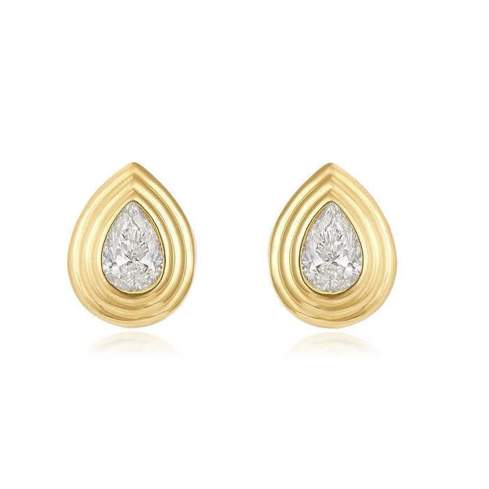 The Karat Concierge Gatsby Stud earrings featuring pear-cut diamonds in 14K yellow gold faceted bezel settings.