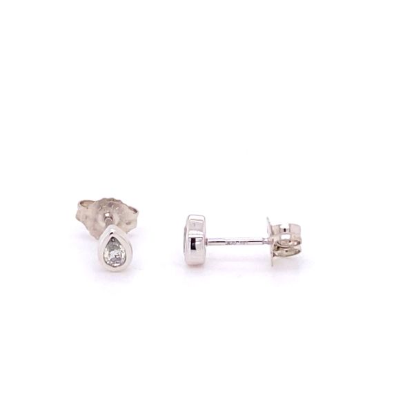 The Karat Concierge pear shaped diamond stud earrings in 14K white gold with a dainty bezel setting