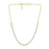 The Karat Concierge Meridian tennis necklace featuring pear-shaped diamonds set in 14K yellow gold.