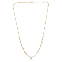 The Karat Concierge Peyton necklace featuring a bezel set emerald cut diamond and round diamonds in 14K yellow gold.