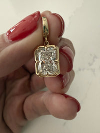 The Karat Concierge 3 CTW radiant cut lab grown diamond pendant in 14K yellow gold with an open bail design.