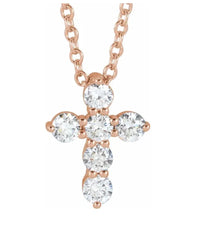 The Karat Concierge rose gold cross pendant necklace featuring five brilliant-cut diamonds on a delicate chain.