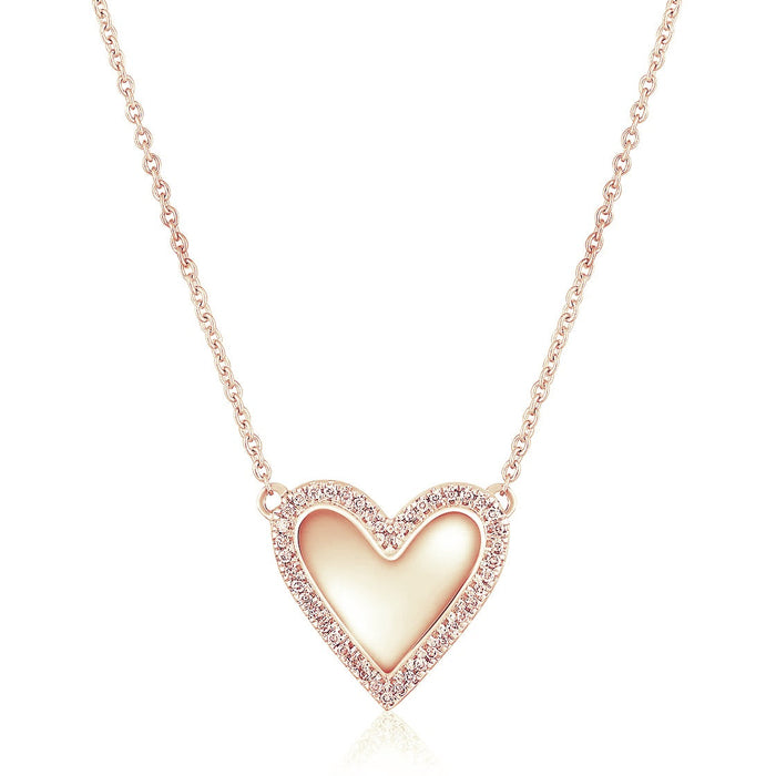The Karat Concierge 14K rose gold bubble heart necklace with a diamond-encrusted border on an 18-inch chain.