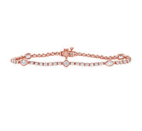 The Karat Concierge Kate bezel set tennis bracelet in rose gold with mixed shape diamonds and round diamond accents.