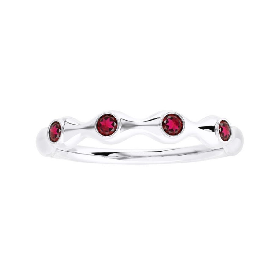 The Karat Concierge bamboo-style ring in 18K gold featuring four round red ruby gemstones in a delicate stackable band.