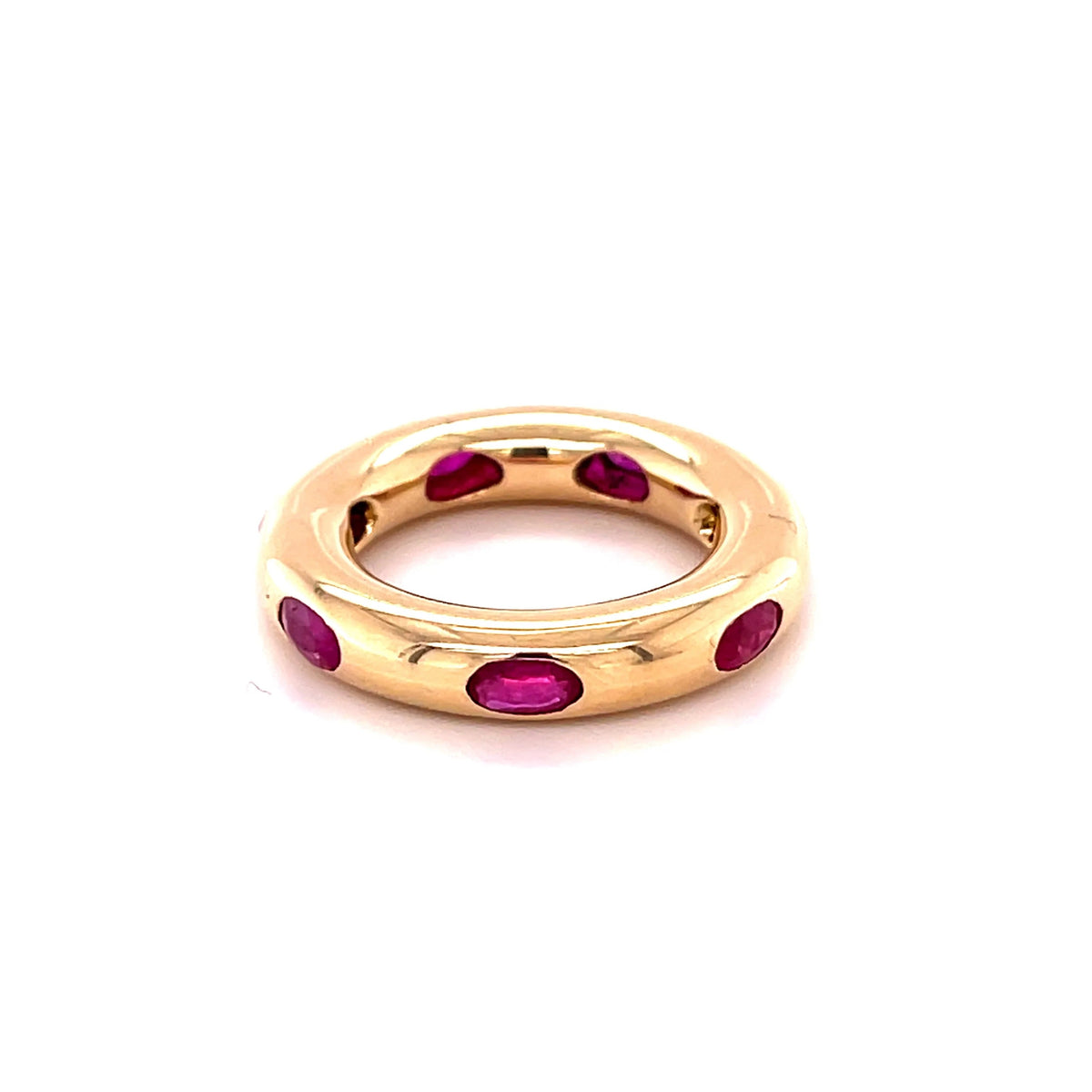 The Karat Concierge 14KT yellow gold donut ring featuring oval-cut rubies in a sleek, whimsical stackable design.