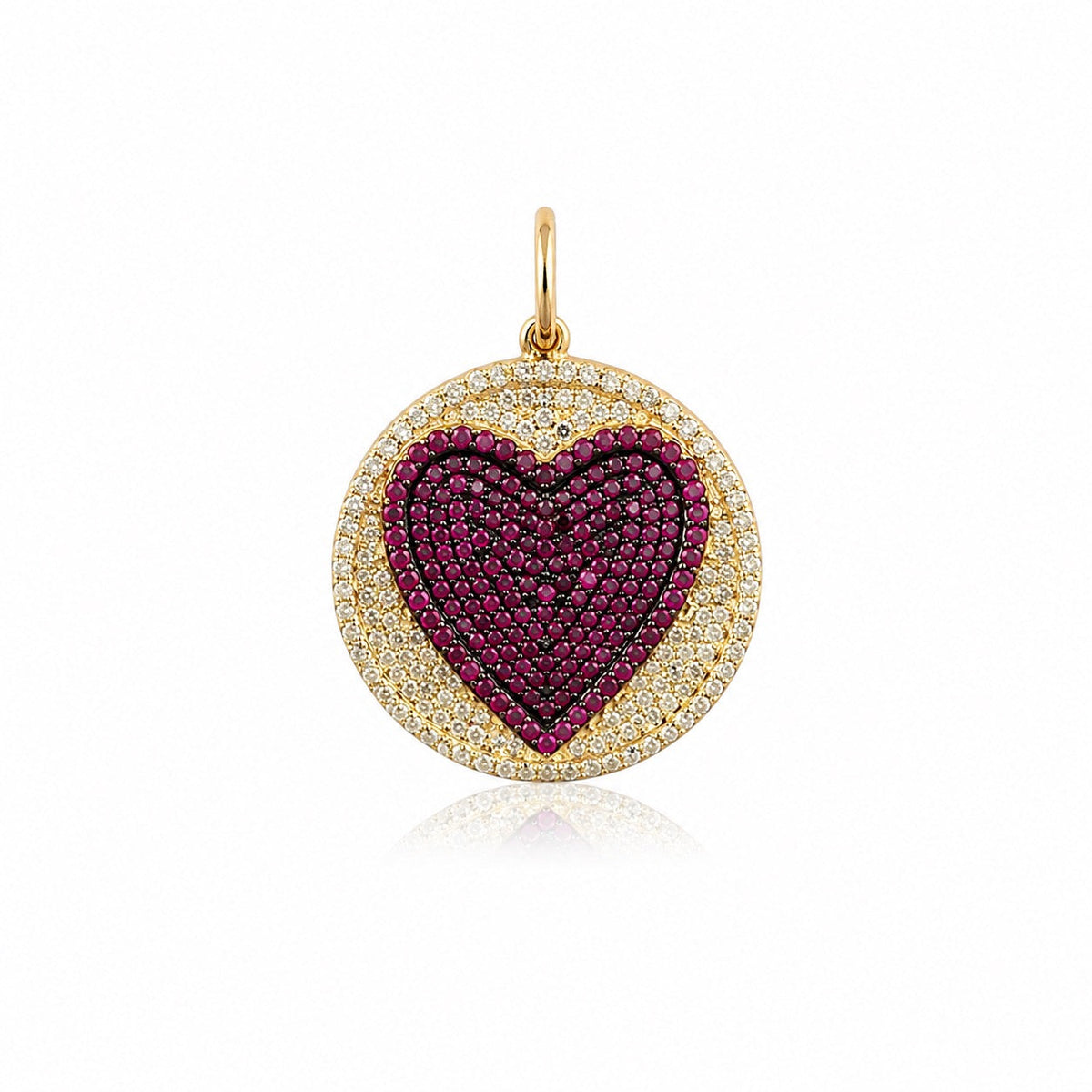 The Karat Concierge round pendant featuring a pavé ruby heart surrounded by sparkling diamonds in 14K yellow gold.