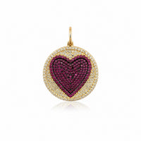 The Karat Concierge round pendant featuring a pavé ruby heart surrounded by sparkling diamonds in 14K yellow gold.