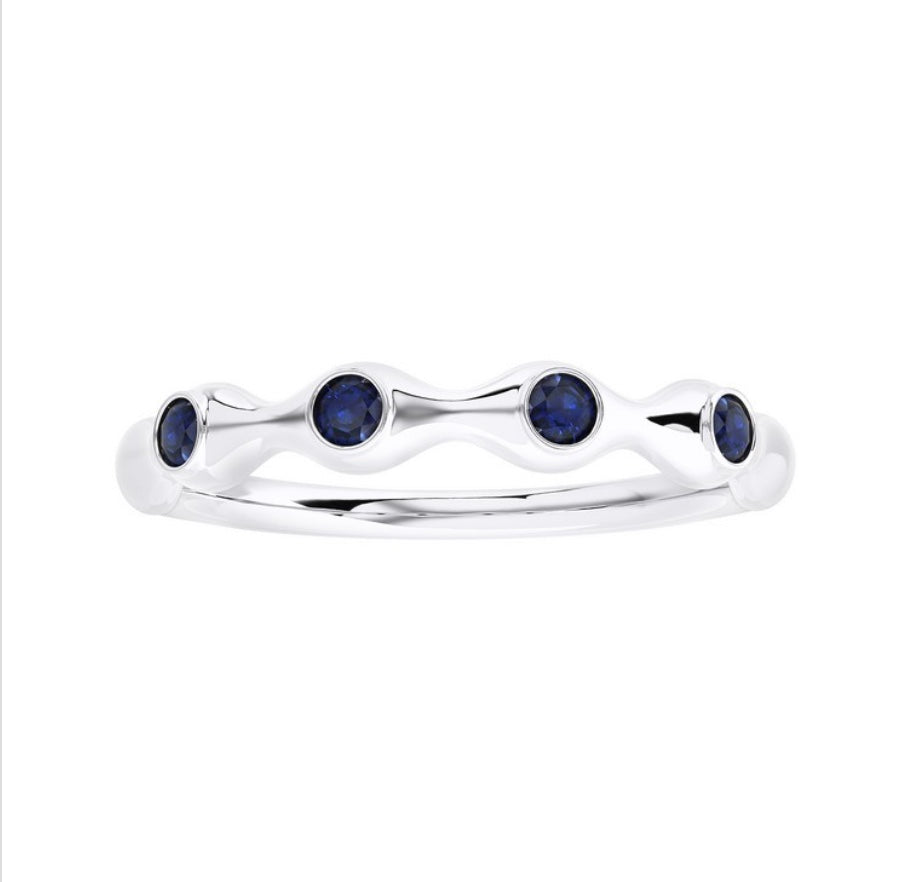 The Karat Concierge sapphire bamboo ring featuring four round blue gemstones set in a polished silver-tone band.