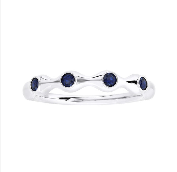 The Karat Concierge sapphire bamboo ring featuring four round blue gemstones set in a polished silver-tone band.