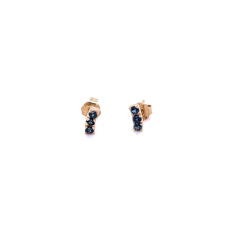 The Karat Concierge 14K yellow gold curved bar earrings featuring three round blue sapphires each.