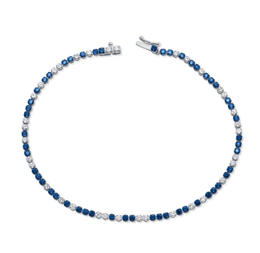 The Karat Concierge sapphire and diamond tennis bracelet in 14K white gold with alternating blue and white stones.